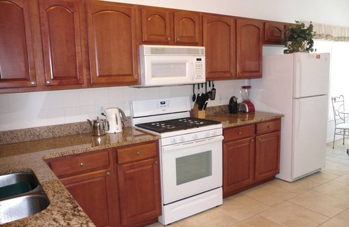 Crescent Lakes House | 4 Bedroom Home in Gated Area on the Lake withSolar Heated Large Pool with Spa