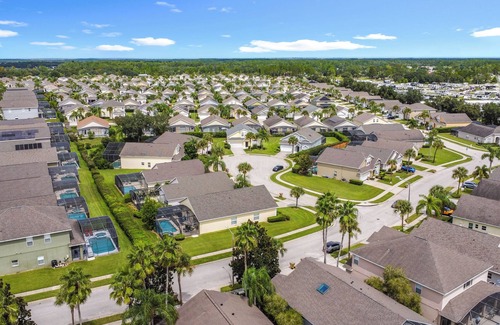 Four Corners Villa | 4-bedroom villa in welcoming Clermont with fitness room, AC
