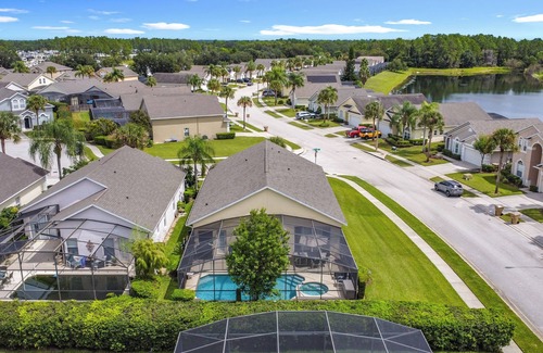 Four Corners Villa | 4-bedroom villa in welcoming Clermont with fitness room, AC