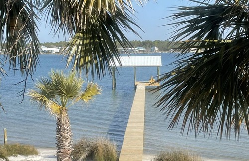 Gulf Shores Cottage | 4 BR Waterfront House with pier & dock, private beach area for our guests.