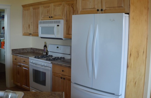 Cherimoya Hill House | 4 KING Beds and 2 bunk rooms. Stand up paddle boards and kayaks included!