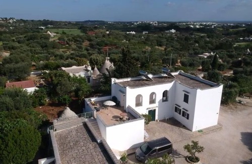 Cisternino Apartment | 4 person, 1st floor appt. Shared, wonderful 9 m. terrace, pool and tennis crt.