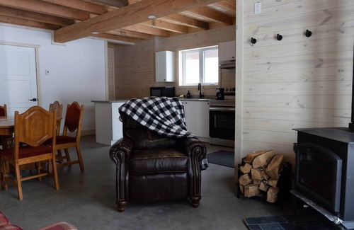 Bowman Ski Chalet | [# 4 The Raven] Chalet on the banks of the river.