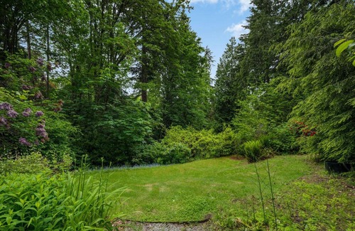 Seahurst House | 4BR with Firepit, Outdoor Dining and Yard Surrounded by Trees