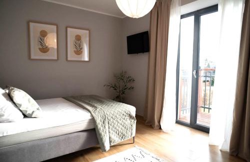 Ilawa Apartment | 4jeziora - prywatny dostęp do rzeki, pomost, ogrodem, wiata grillowa, rowerek wodny, kajaki i SUP w cenie, parking, psiaki dozwolone