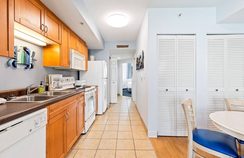 North Myrtle Beach Condo | 4th-floor condo with pool, Hot Tub, private W/D, marina view, & central AC