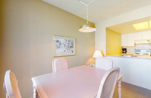Upper Village Condo | 4th-floor condo with heated pool, hot tub, gym, balcony, fireplace, W/D, sauna