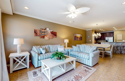 Sunset Island Condo | 4th-floor condo with out/indoor pools, gym, community beach, fast WiFi, W/D, AC