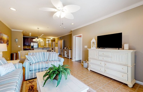 Sunset Island Condo | 4th-floor condo with out/indoor pools, gym, community beach, fast WiFi, W/D, AC