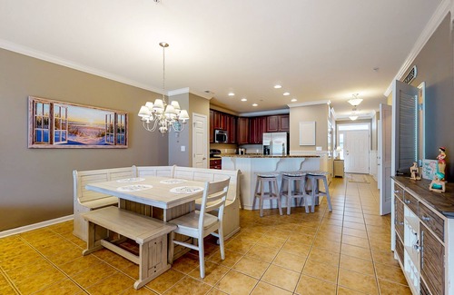 Sunset Island Condo | 4th-floor condo with out/indoor pools, gym, community beach, fast WiFi, W/D, AC