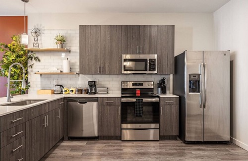 Downtown Louisville Apartment | 4th Street Suites - Serene King Bed Suite
