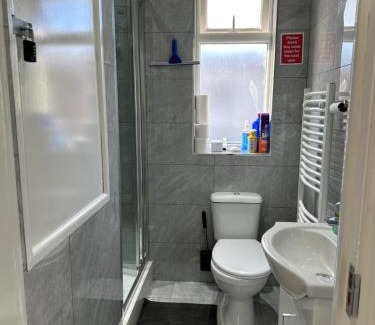 Downham Apartment | 4TH Studio Flat With Private Own Bathroom A London Luxury Family Home Setup and furnished With Double Bed plus A Double Futon-Sofa Bed A Single Futon Bed A Baby Cot and Garden and Free Parking