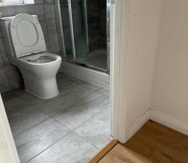 Downham Apartment | 4TH Studio Flat With Private Own Bathroom A London Luxury Family Home Setup and furnished With Double Bed plus A Double Futon-Sofa Bed A Single Futon Bed A Baby Cot and Garden and Free Parking