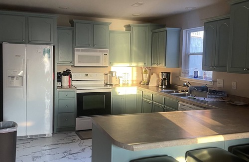Osage Beach House | 5 Bedroom, 5 Bathroom Tropical Fun! HOT TUB, AQUA PAD, FIRE PIT, and BEACH!