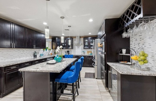 Paradise House | 5 beds/3 full bath home,swimming spa/hottub/outdoorkitchen/firepit.Closetostrip