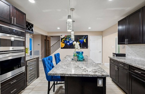 Paradise House | 5 beds/3 full bath home,swimming spa/hottub/outdoorkitchen/firepit.Closetostrip