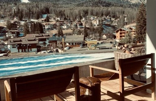 Cortina d'Ampezzo Historic Centre Apartment | 5* Central Cortina newly refurbished. 3’ from Freccia nel Cielo cable car.