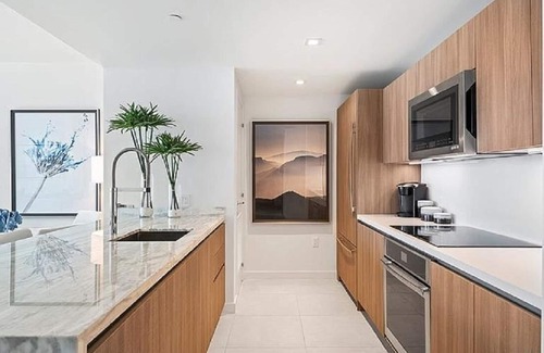Central Beach Condo | 5-Star Luxury Condo at Tiffany House, two rooftop pools, one block from beach