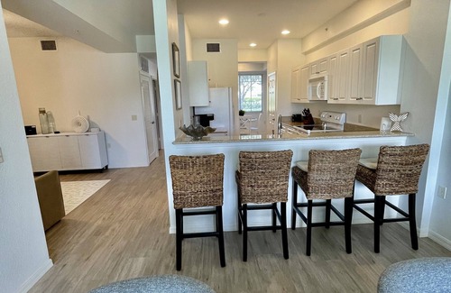 Naples Condo | 5 Star reviews! 1st floor coastal condo Pretty fountain views! Free Golf May-Oct