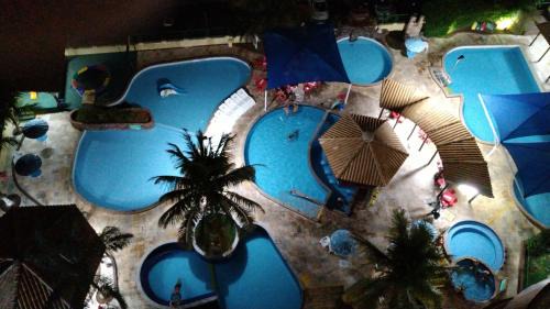 Do Turista Apartment | 504 - AP shopping, bebidas liberadas nas piscinas e internet banda larga no AP, Wi-Fi, próximo ao shopping Singapura