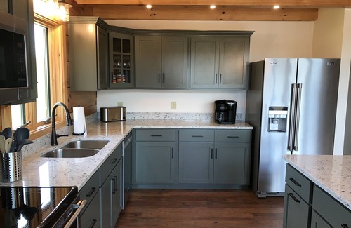 Gilbertsville Cabin | 6 Bedroom Waterfront Log Home with EV charging!