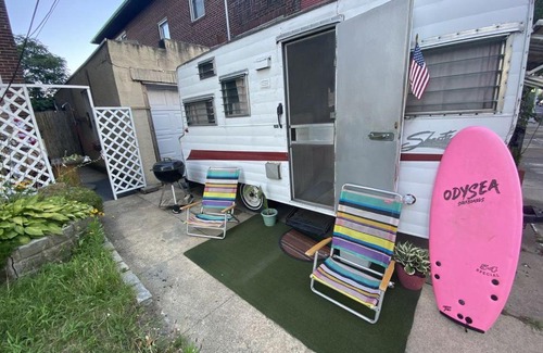 Queens Ski Chalet | 60s Surf Camper with NYC Skyline View in Rockaway Beach