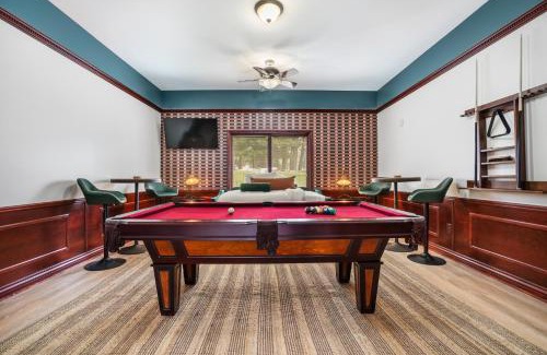Prudenville House | 6BR Houghton Lake House with Indoor Pool, Hot Tub and Golf Simulator