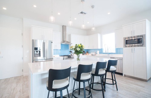 West Bay Condo | 7 Mile Beach Penthouse with Private Beach Club. Ocean views from Roof Terrace.