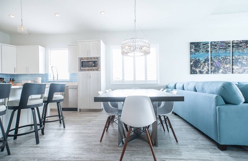 West Bay Condo | 7 Mile Beach Penthouse with Private Beach Club. Ocean views from Roof Terrace.