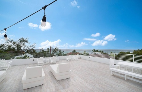 West Bay Condo | 7 Mile Beach private Beach Club, ocean views from Roof deck and Pool Pavilion