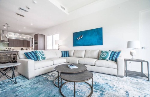 West Bay Condo | 7 Mile Beach views from the Roof terrace. Luxury Condo with Private Beach Club