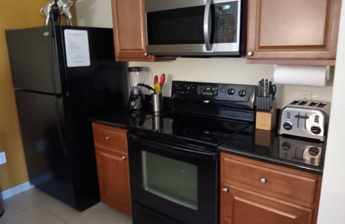Florida Central Atlantic Coast Condo | 7 minutes from Disney Theme Parks fits 5