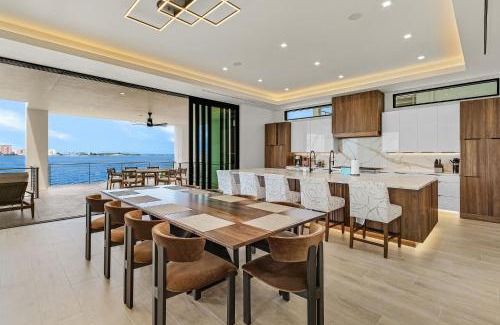 Fort Myers Beach House | 793 Shoreline Estate- 6BD 6BR, Luxurious Pool Home on The Water! home