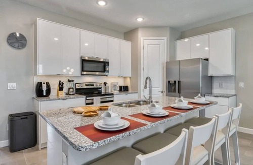 West Kissimmee House | 7961 Luxurious 4-Suite Villa with Private Pool 10 Minutes from Disney