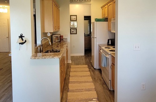 Villages of Five Points Condo | 8 minutes to the beach in the villages of five points first floor condo