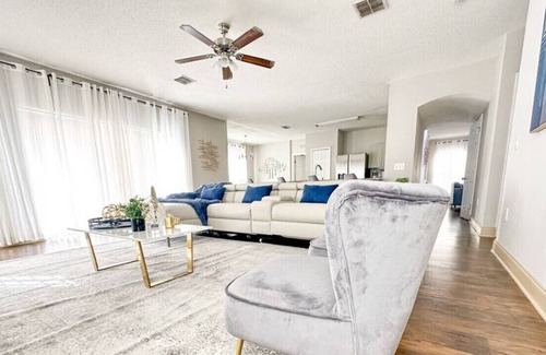 Poinciana House | 806 Provence Way · Cozy Home 5BD Themed bedroom
