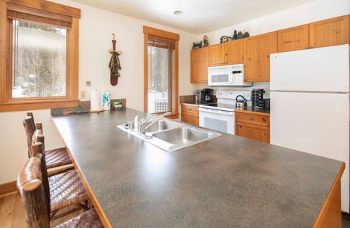 River Run Condo | 8808 | Springs, wood floors, steps to Gondola!