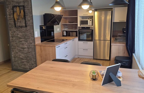 Mezidon-Canon Apartment | 9-person apartment Garden and swimming pool in town center