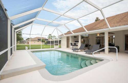 Palm Harbor House | 9863SANDYDRPCHN - Summer Daze