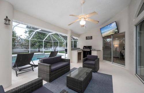 Palm Harbor House | 9863SANDYDRPCHN - Summer Daze