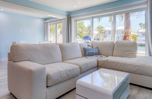 Key Colony Beach House | 9th Street Retreat: Gorgeous Updated Canal Front Home, Dockage, Access to Cabana Club's Pool & Beach