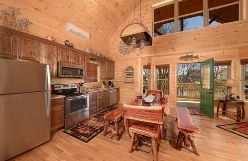 Pigeon Forge Cabin | A Barrel of Fun-Cozy 2-Bedroom RIVERFRONT Cabin near Island in Pigeon Forge