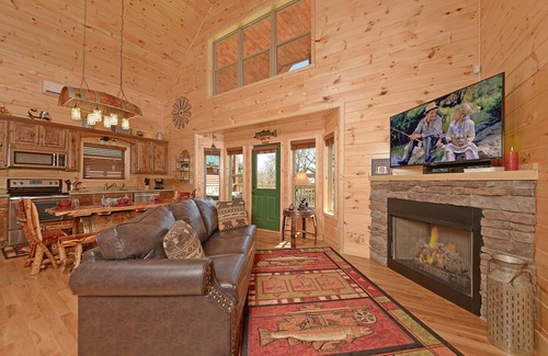 Pigeon Forge Cabin | A Barrel of Fun-Cozy 2-Bedroom RIVERFRONT Cabin near Island in Pigeon Forge