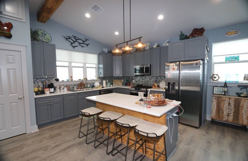 Grand Isle House | A-Bear's in Grand Isle, LA: Spacious 3BR camp with waterfront views and boat access.