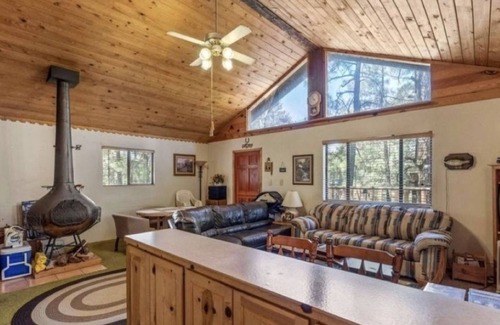 Show Low Cabin | A centrally located secluded mountainside log cabin w/panoramic valley views.