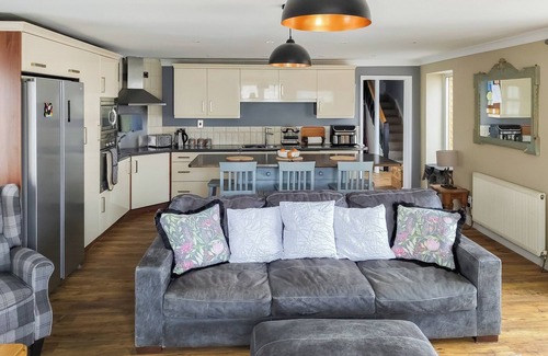 Wisbech Cottage | A charming riverside cottage in Upwell, accommodating up to 10 guests.