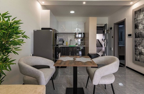 Lavington Apartment | A Cozy apartment in terrific Nairobi with WiFi, gym, study area and balcony view