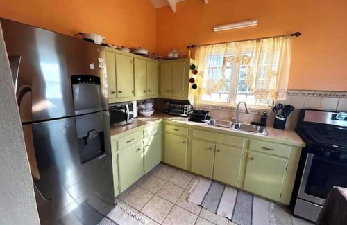 Saint John Parish House | A Cozy Cottage located on the beautiful island of Antigua, close to shops/beach.