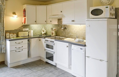 Costessey Cottage | A dog friendly cottage for four with its own swimming pool and enclosed garden.