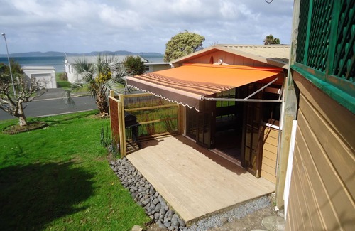 Snells Beach Cabin | A Fantastic Locationn"Just a short walk down the footpath opposite to the Beach"